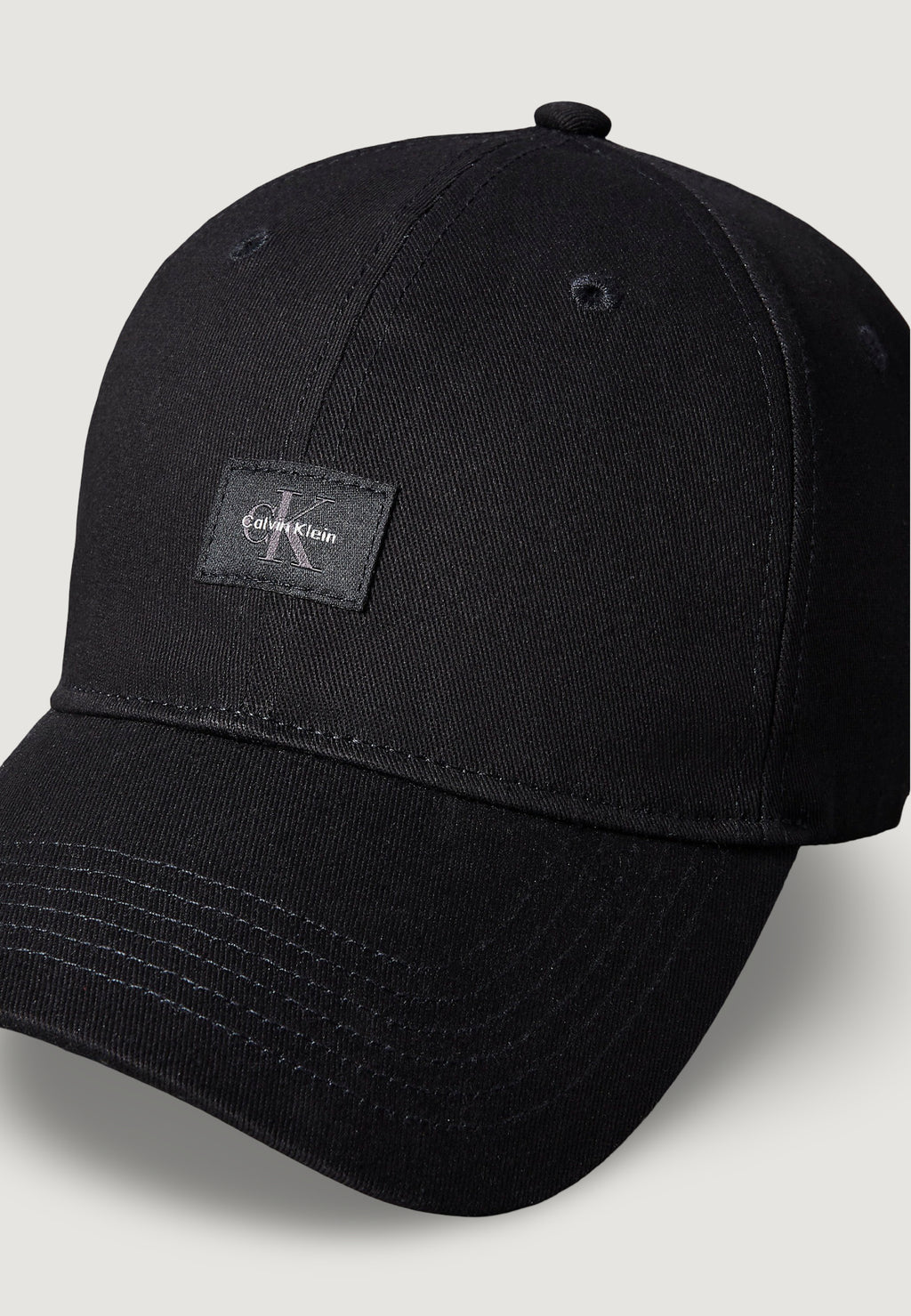 Cappello con visiera Calvin Klein MONOLOGO WOVEN PATCH BB