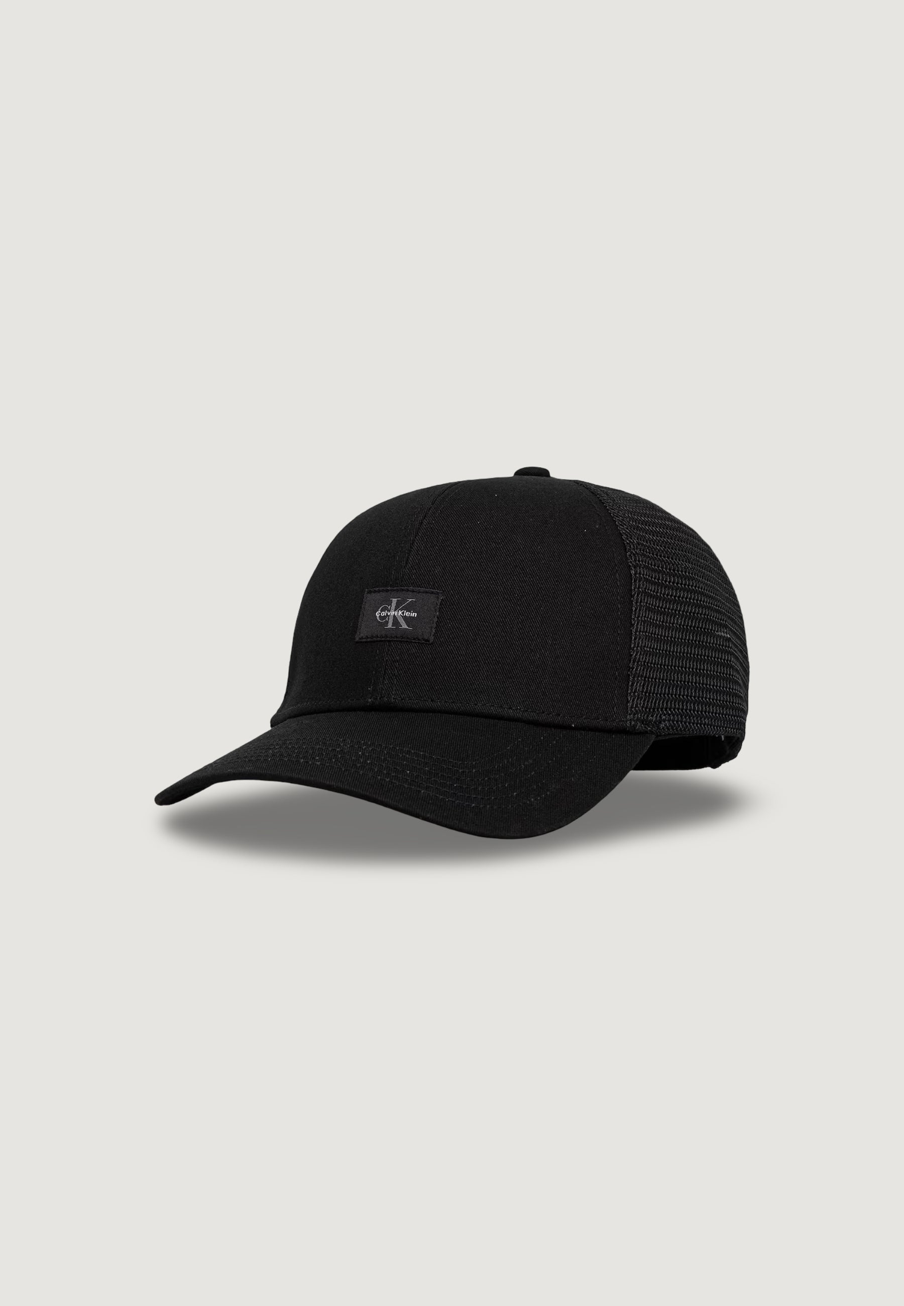 Cappello con visiera Calvin Klein MONOLOGO WOVEN PATCH TRUCKER