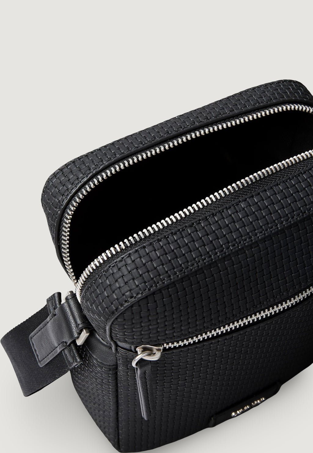 Sling bag Calvin Klein EMBOSSED WOVEN REPORTER
