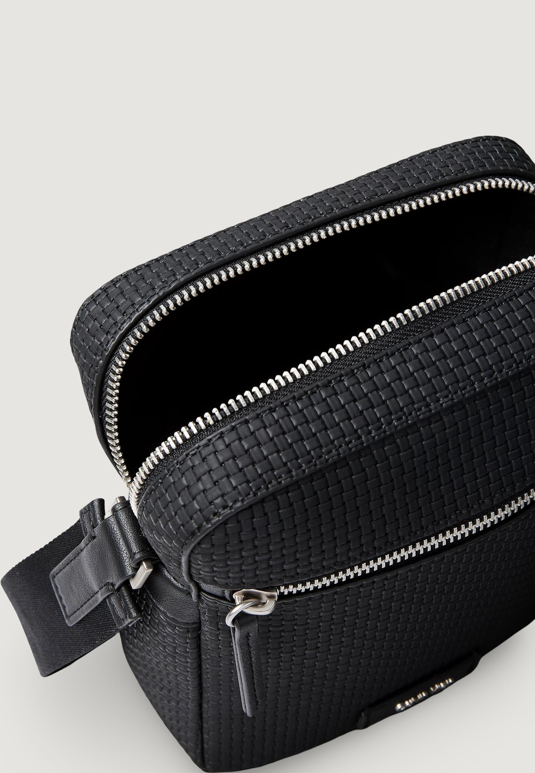 Sling bag Calvin Klein EMBOSSED WOVEN REPORTER