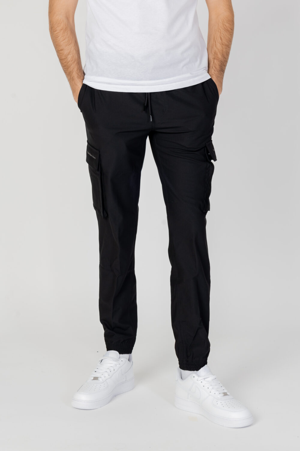 Pantaloni sportivi Calvin Klein Jeans TECHNICAL LOGO REPEA Nero - Foto 1