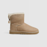 Stivali UGG MINI BAILEY BOW II Beige chiaro - Foto 1